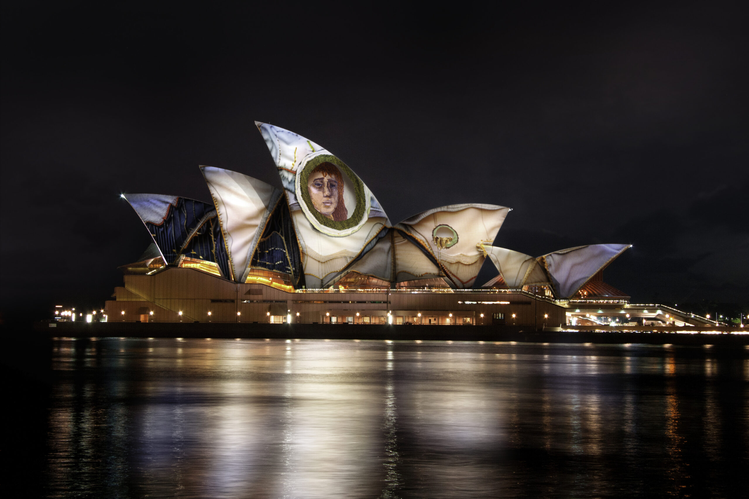The sails of the Sydney opera house lit up in a work called Echo (2024) by Archibald Prize winner Julia Gutman.