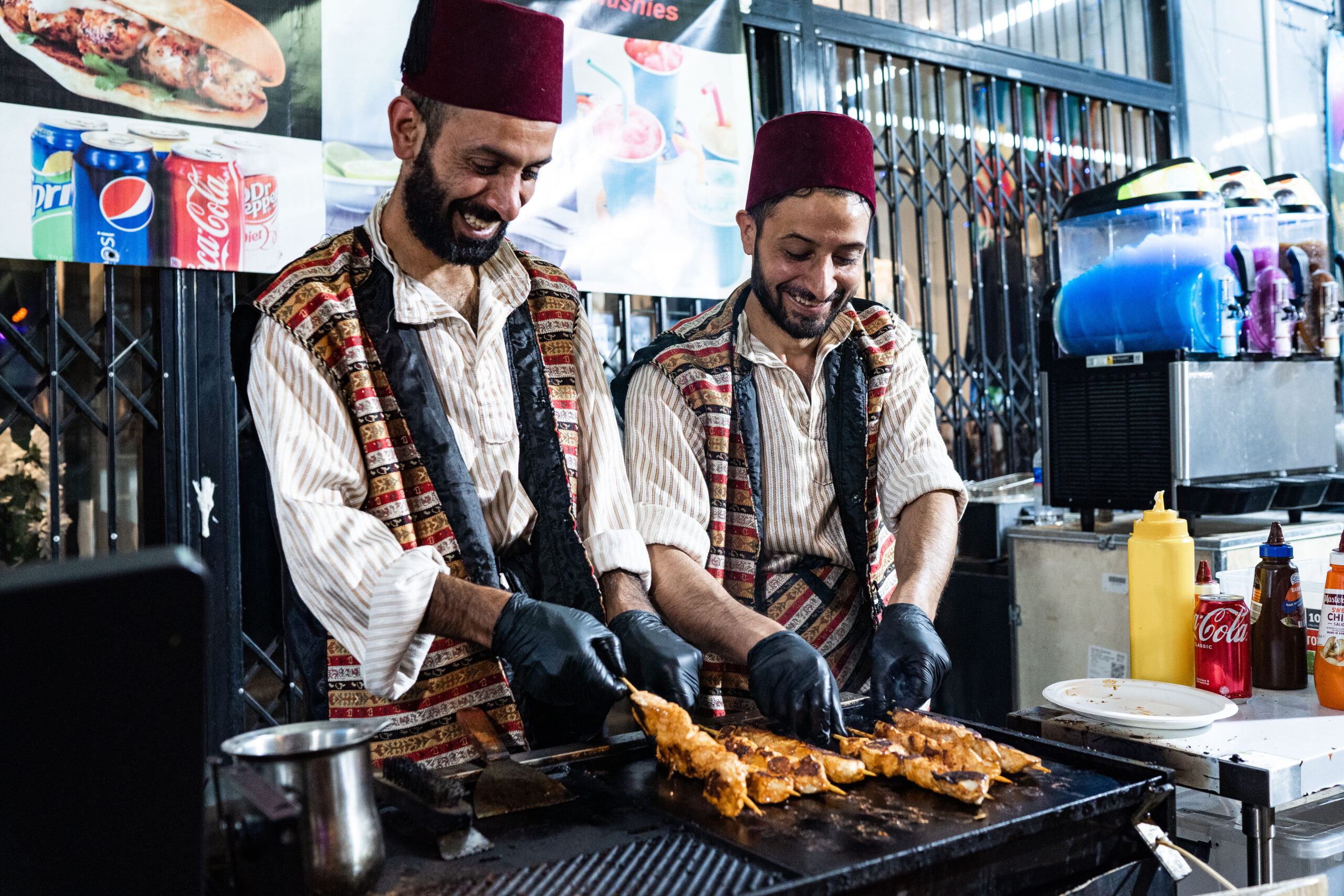 two chefs shown cooking kebabs at Ramadan Nights which is part of the autumn calendar in Sydney