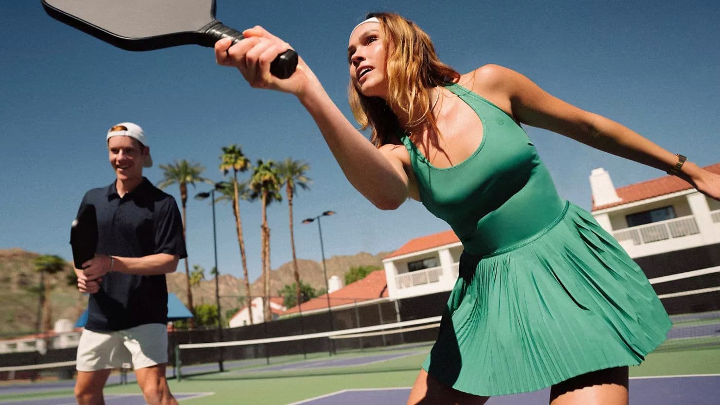 Woman playing pickleball outdoors sydney