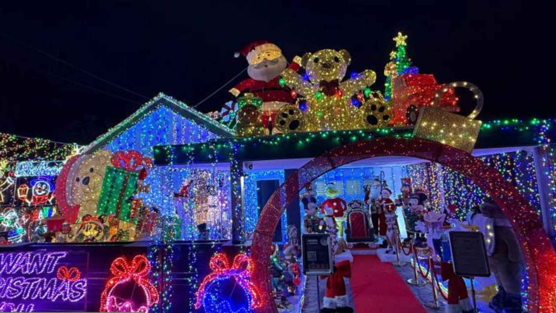 house lit up with Christmas lights