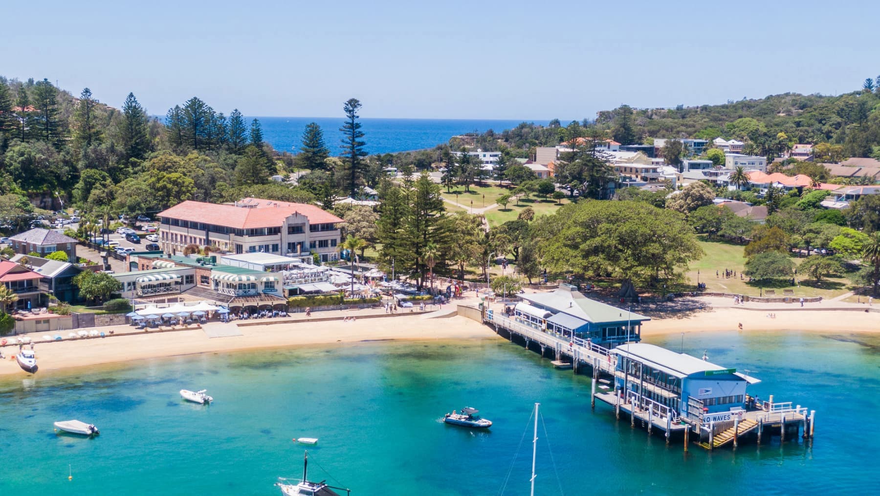 Watsons Bay Boutique Hotel in Sydney with the pier in the foreground.