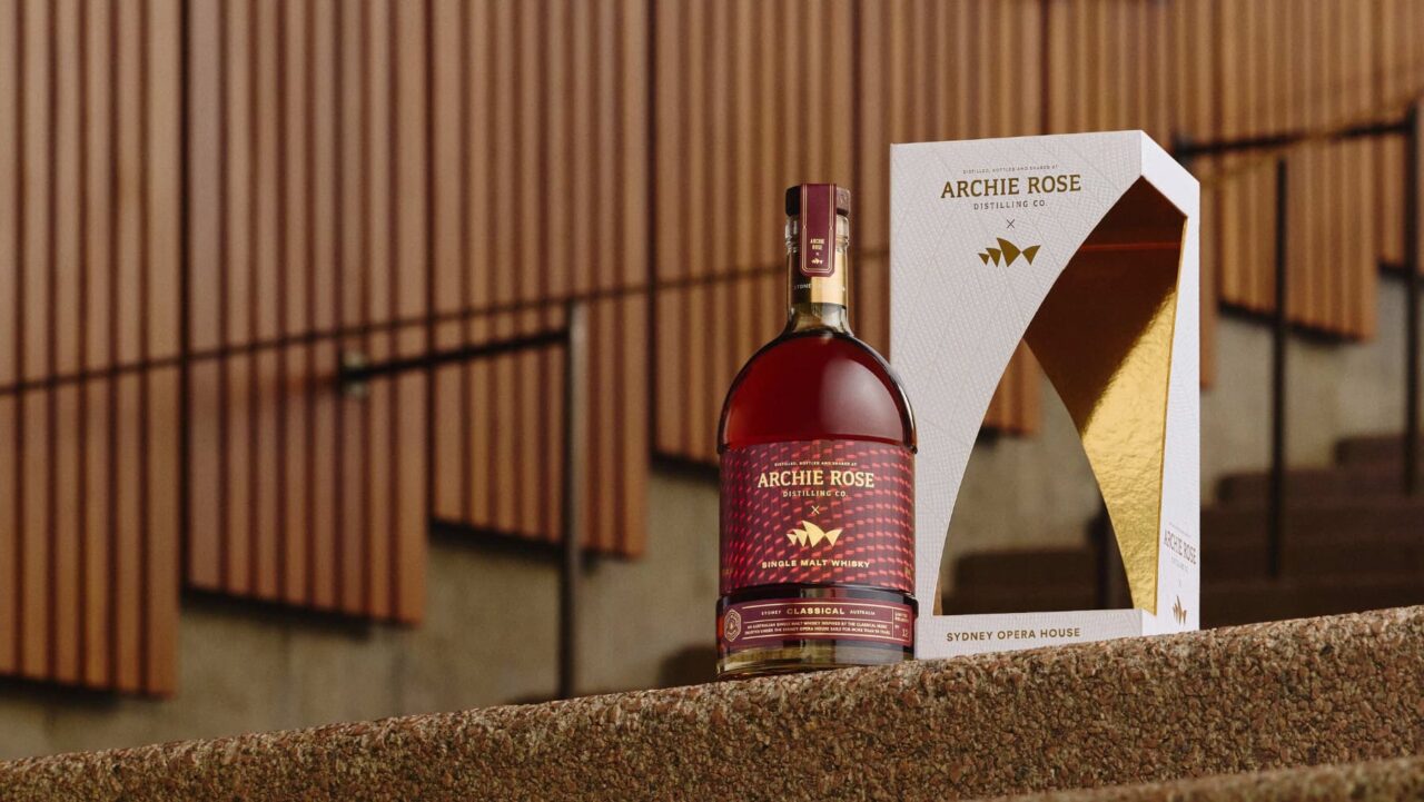 A bottle of whisky sitting on the Sydney Opera House steps