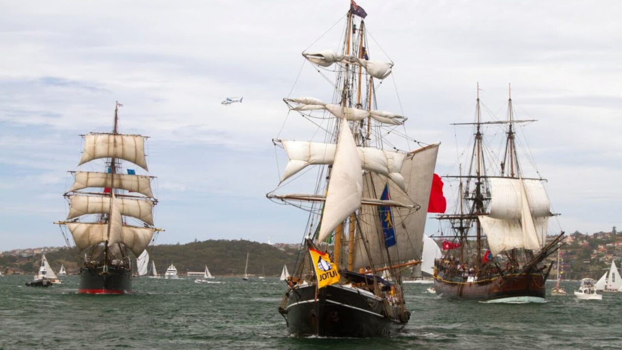 Three Sydney Tall Ships cruising Sydney Harbour on Australia Day.