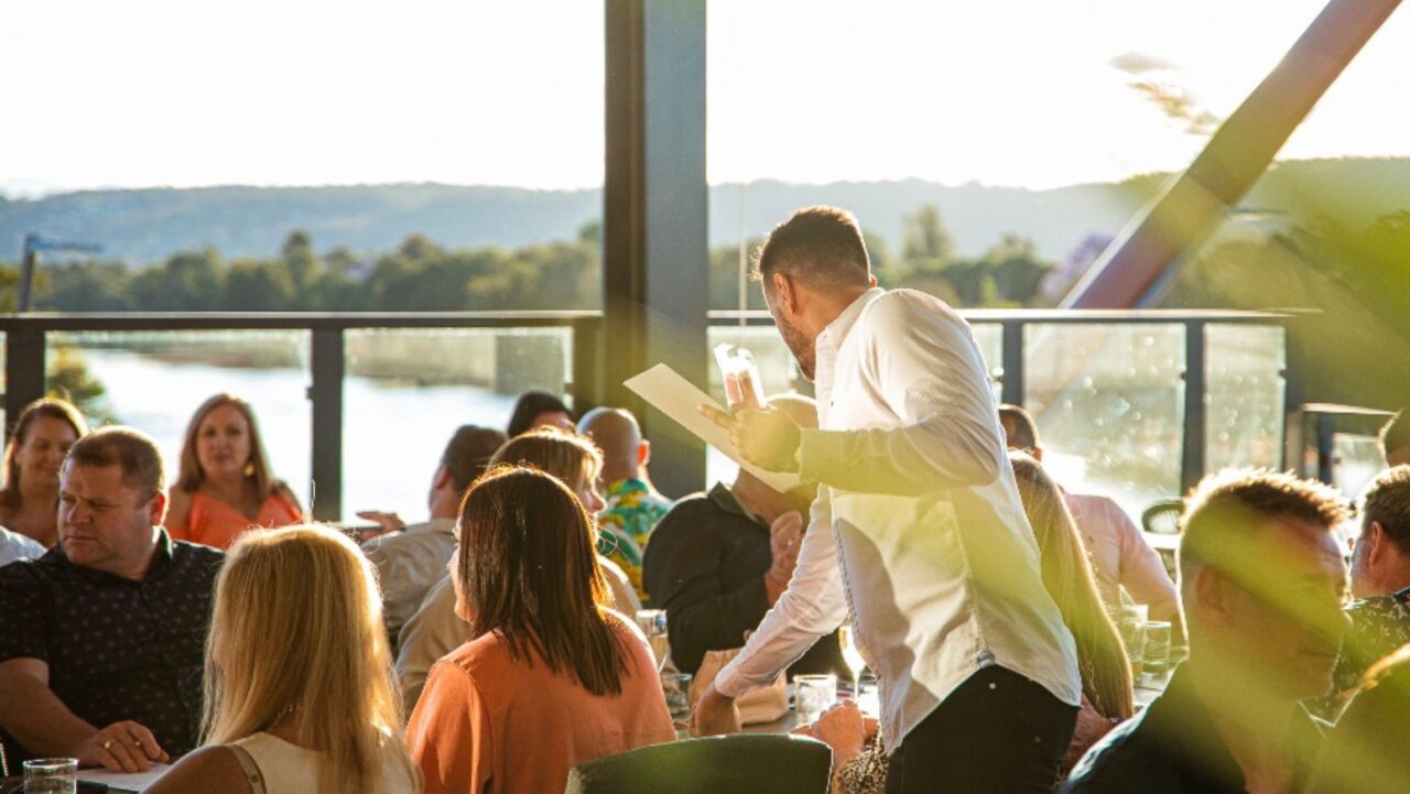 a restaurant overlooking a river