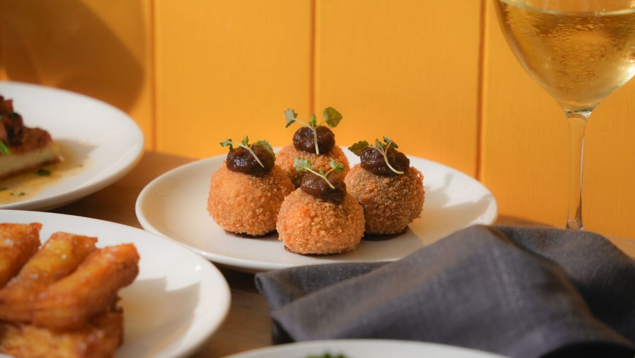 Morcilla sausage croquettes (centre) and pavé potatoes (left) are some of Jose Garcia's South American-inspired dishes at tqm.