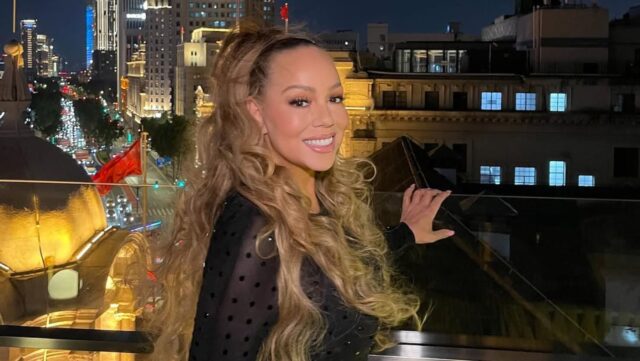 a woman smiling at the camera