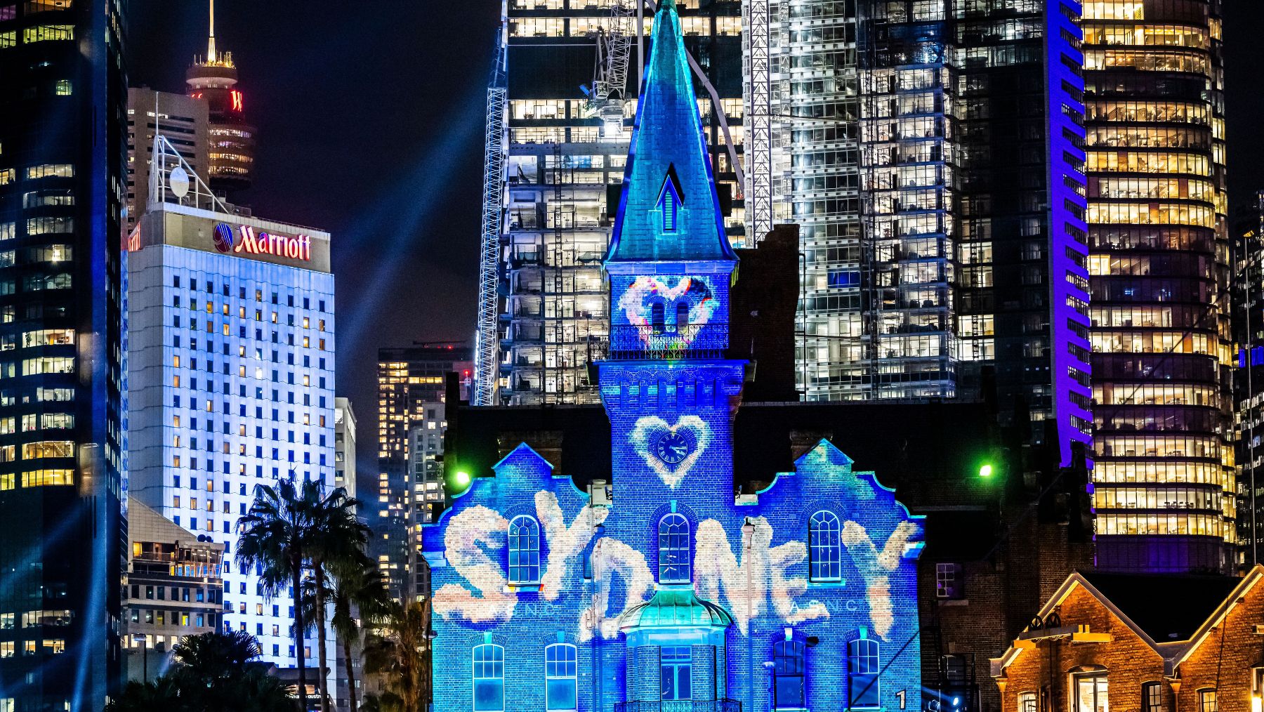 The ASN Clock Tower is transformed into a canvas for us all with this interactive and community-made projection. Featuring your contributions along with submissions from our 2025 Charity Partner, the Sydney Children’s Hospitals Foundation. Artist - Mr Beam. Vivid Sydney
