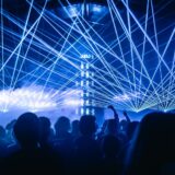 Revellers are pictured beneath lasers and lights that say DUNJ. The Sydney-based crew will host a late-night party in The Studio at Sydney Opera House this weekend.