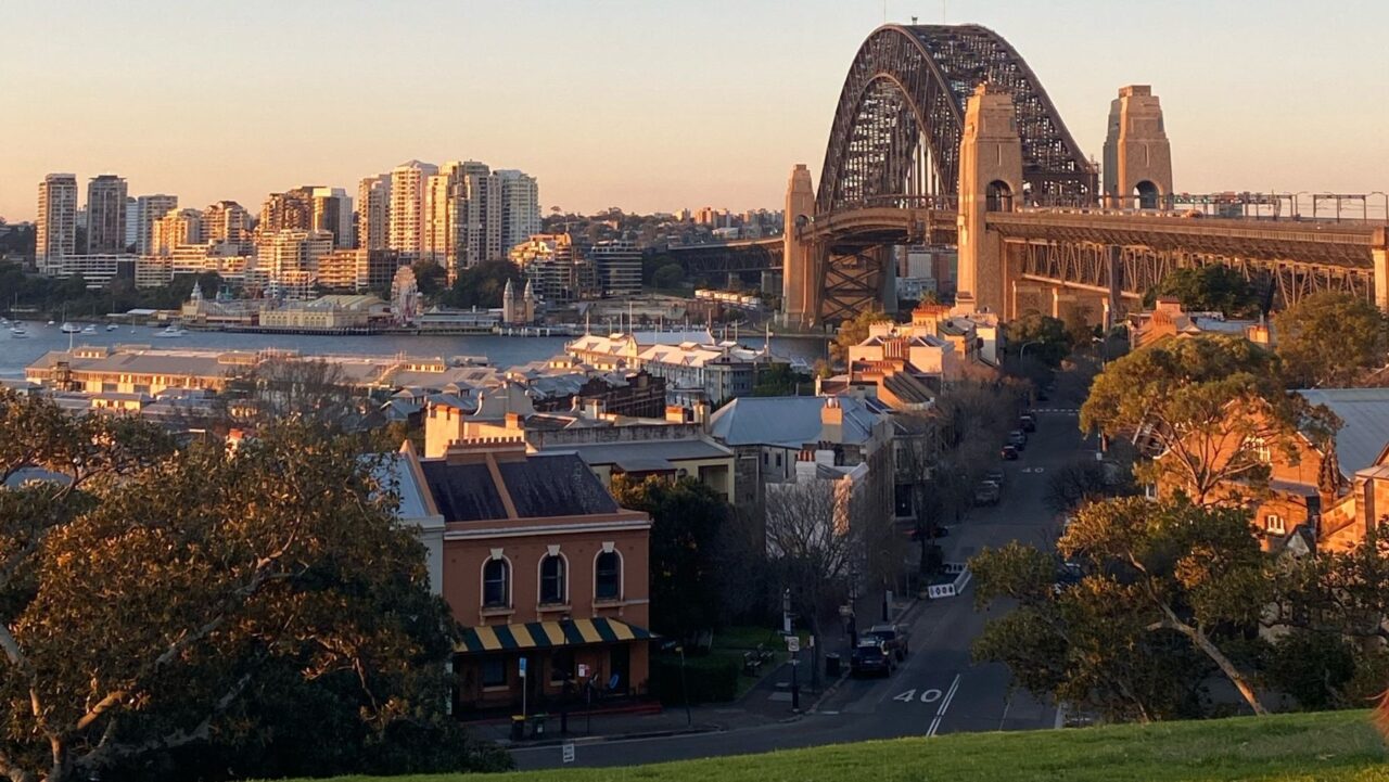 Watch the sun set over the harbour from Observatory Hill, Millers Point in Sydney.