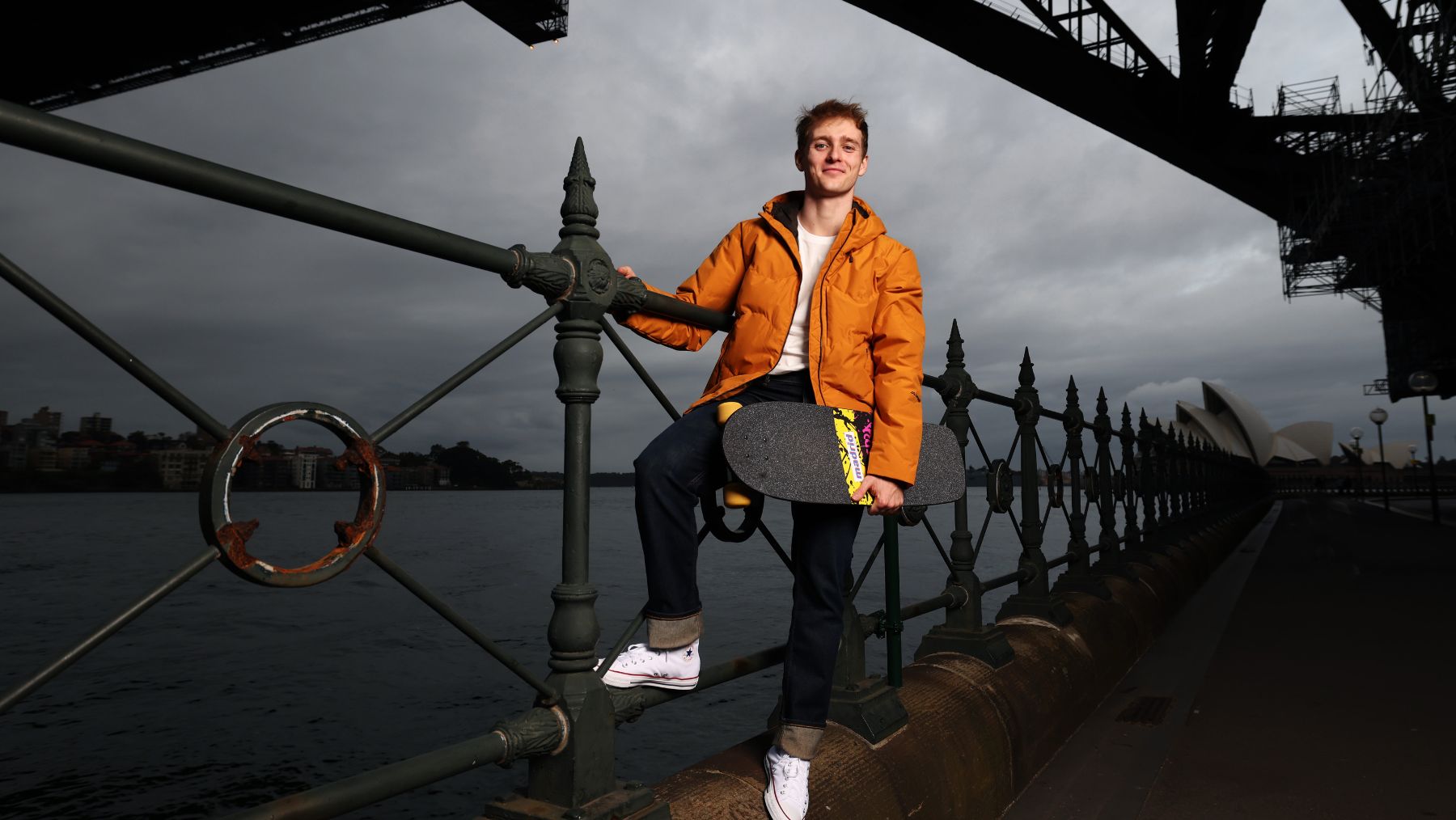 Alex Duffy is pictured beneath Sydney Harbour Bridge, in the announcement of his role as Marty McFly in Back to the Future The Musical in Australia.