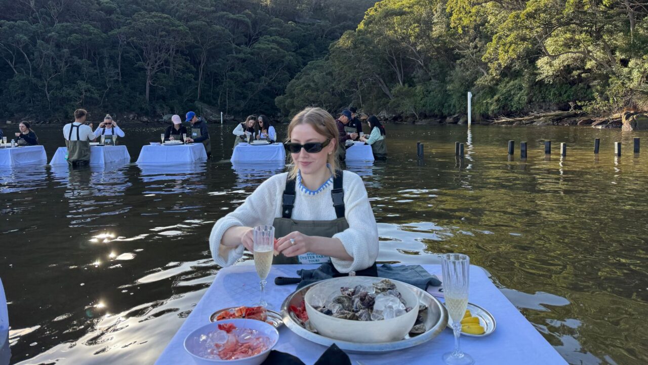 Izzie shucking oysters