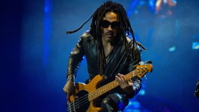 Lenny Kravitz playing guitar