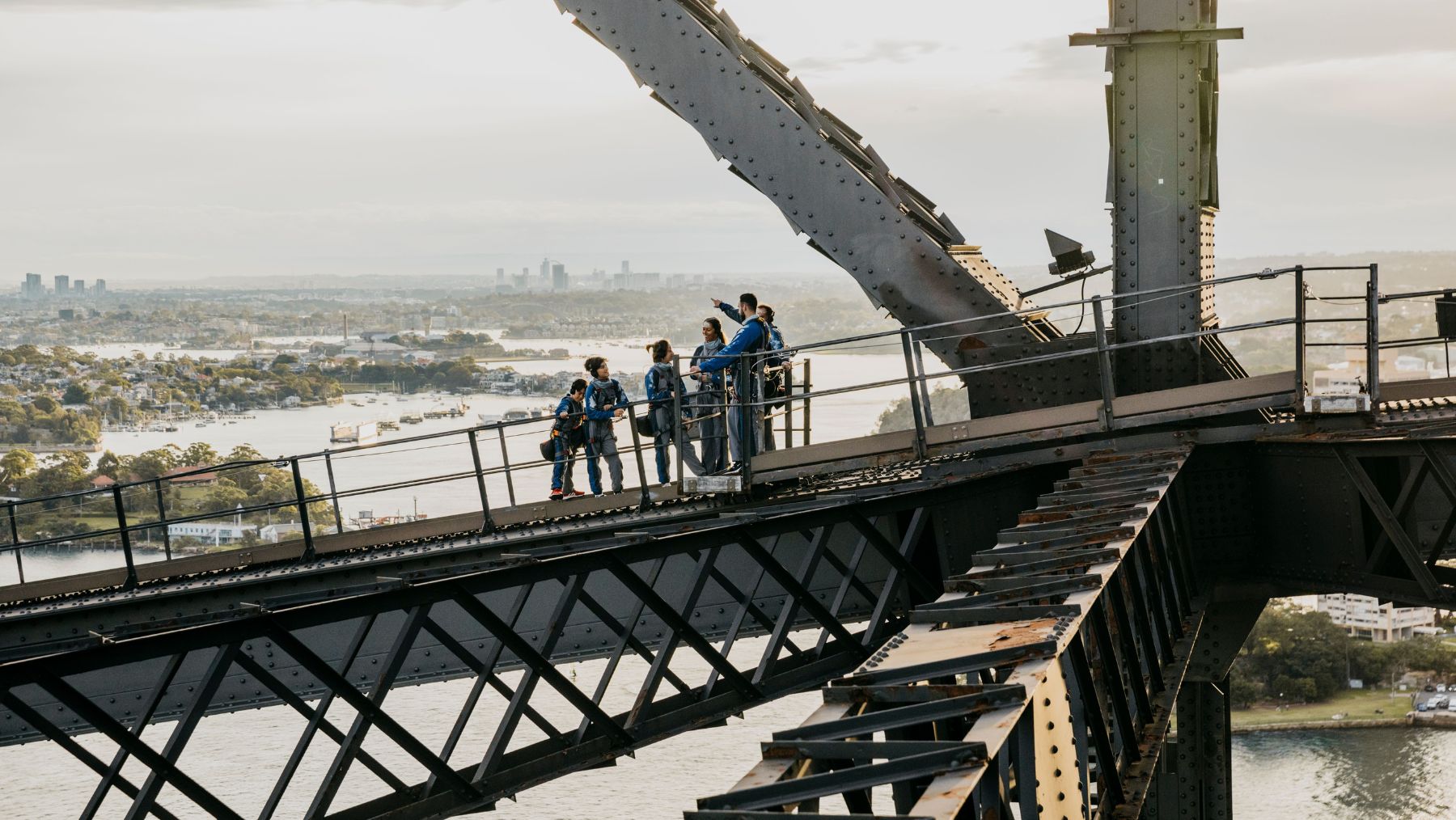 Family climbing Sydney Habour Bridge with BridgeClimb