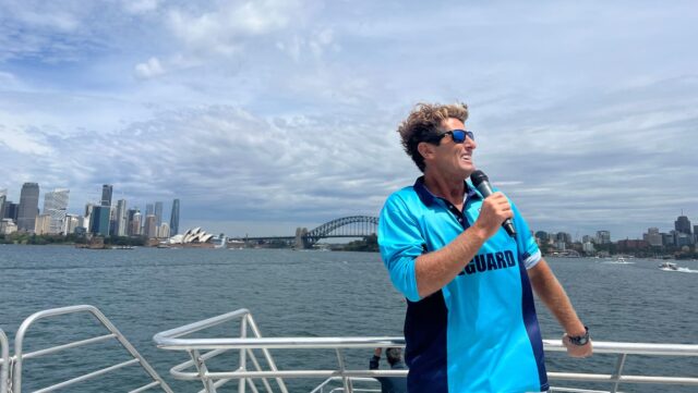 Harries Bondi Rescue in front of the Sydney Opera House and harbour bridge