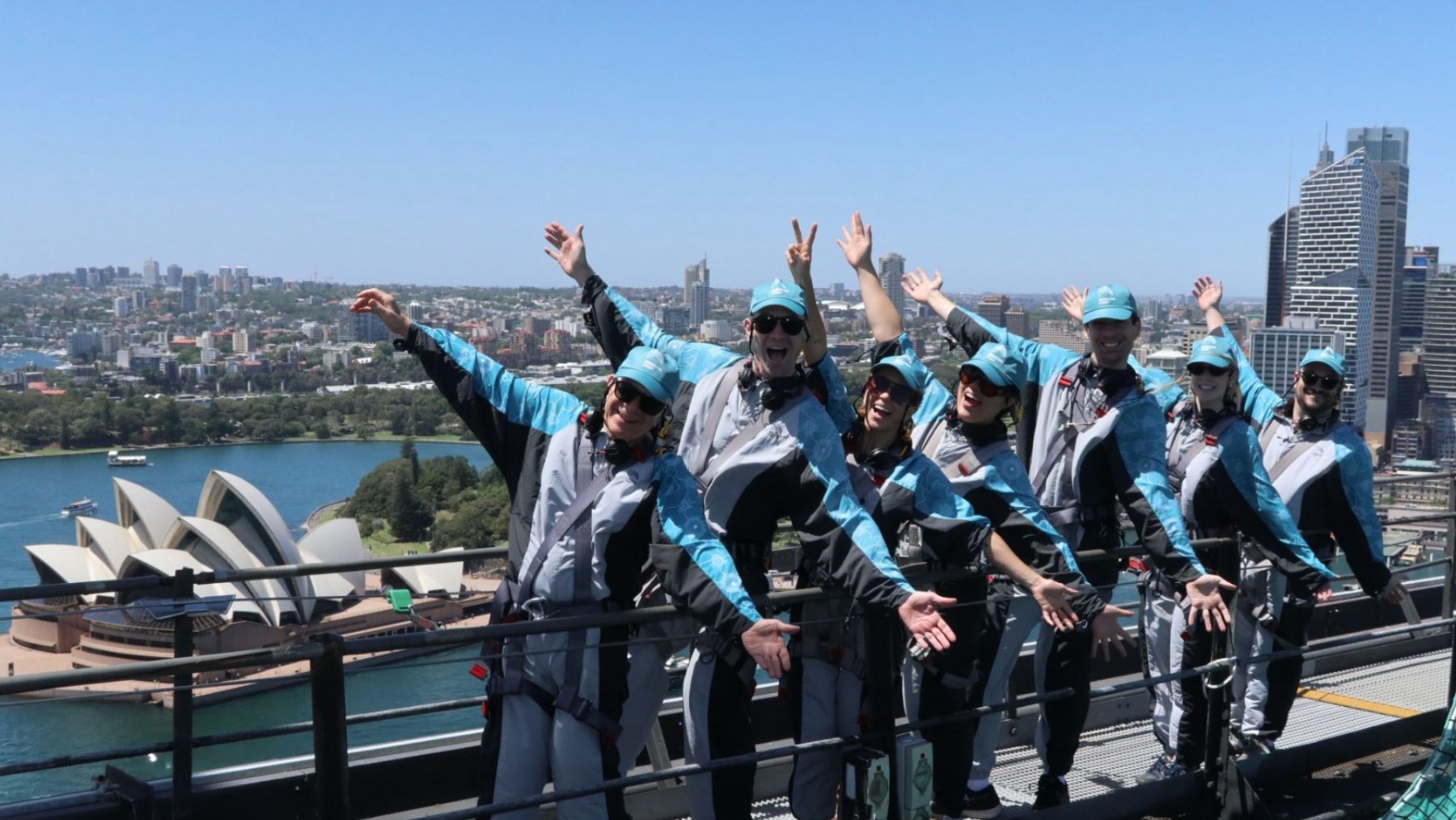 a group of climbers ascend the Bridge Climb