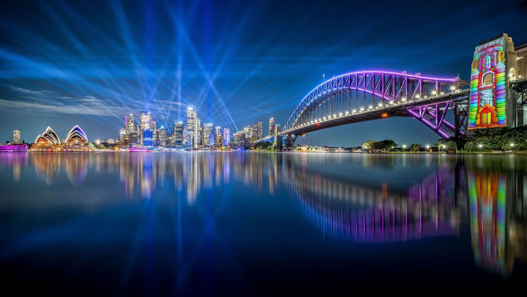 Colorful lights over Sydney skyline for Vivid Sydney 2026