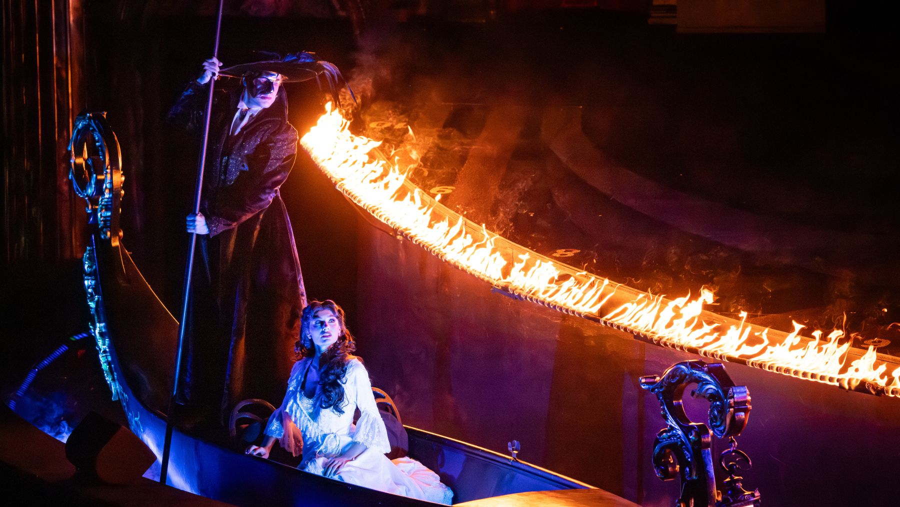 Jake Lyle as The Phantom and Amy Manford as Christine Daaé in Handa Opera on Sydney Harbour's 2026 production of The Phantom of the Opera. Credit Daniel Boud