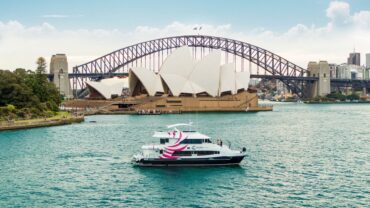 Journey Beyond ship with the Sydney Harbour Bridge and Sydney Opera House in the background