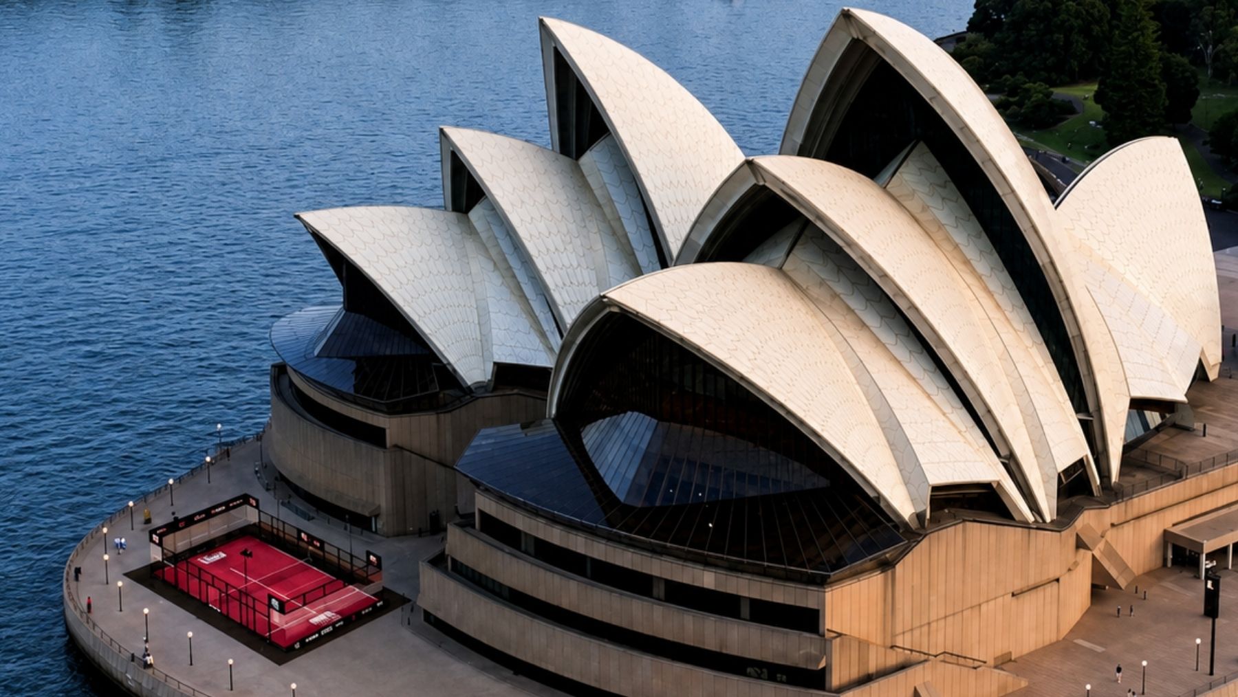 a computer generated image of a padel court outside the Sydney Opera House